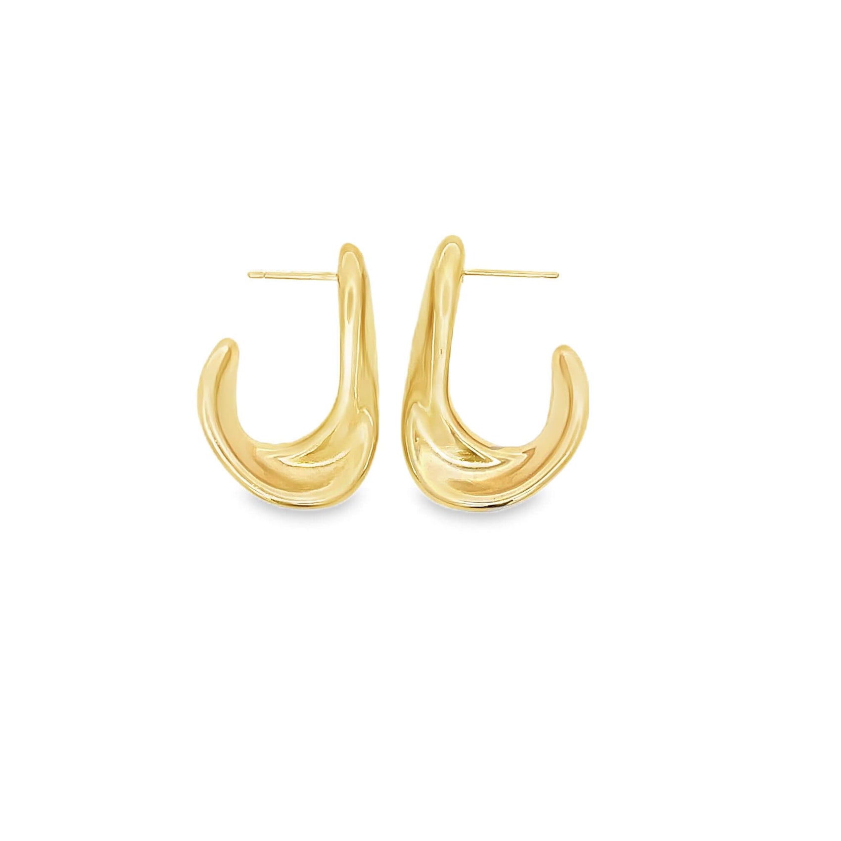 A pair of polished gold hoop earrings shaped with a smooth, organic teardrop design rests against a plain white background.