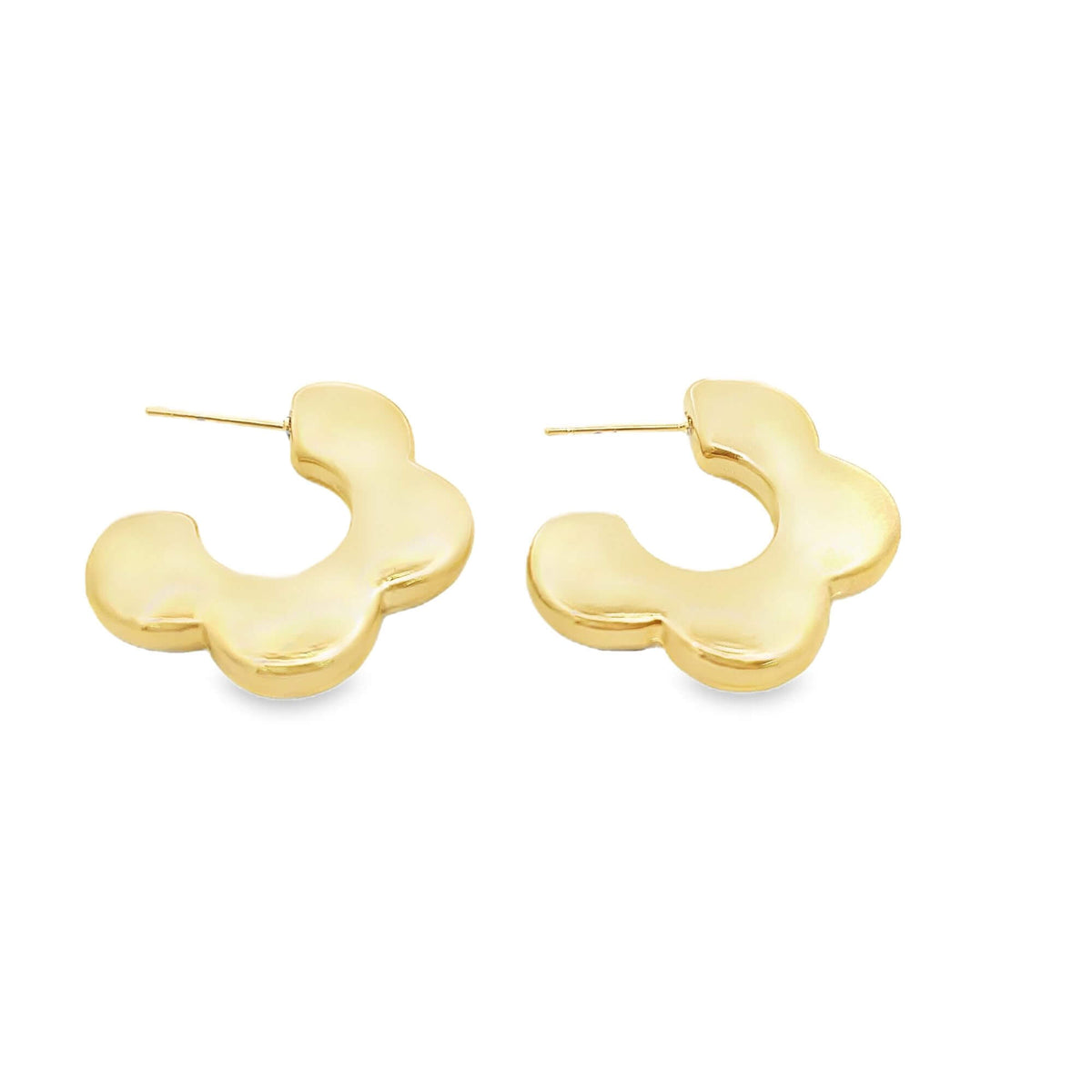 A pair of chunky gold flower-shaped hoop earrings rests against a clean white background.