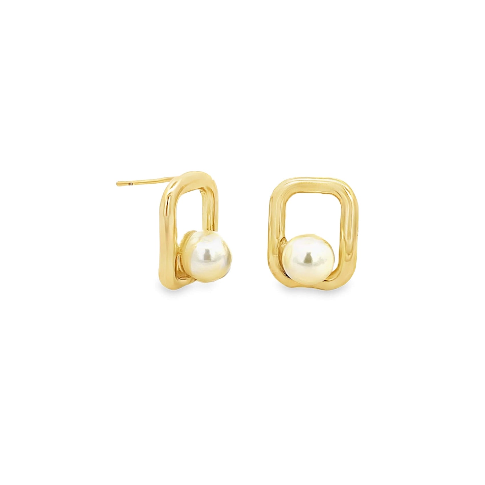 A pair of gold geometric stud earrings features suspended white pearls against a clean white background.