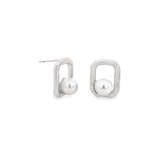 A pair of modern silver geometric stud earrings featuring sleek rectangular loops cradling lustrous white pearls.