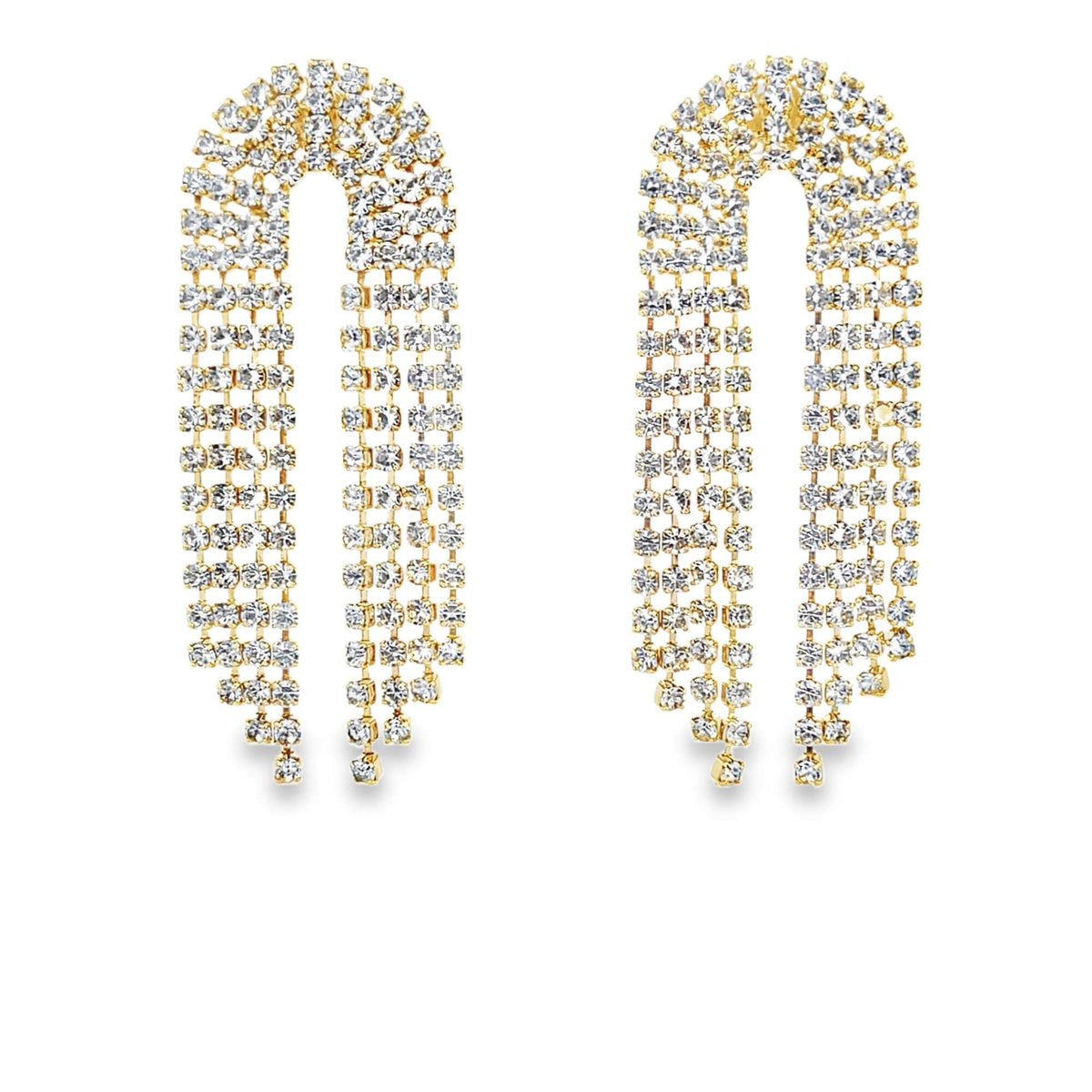 A pair of U-shaped gold rhinestone fringe earrings sparkle against a clean white background.