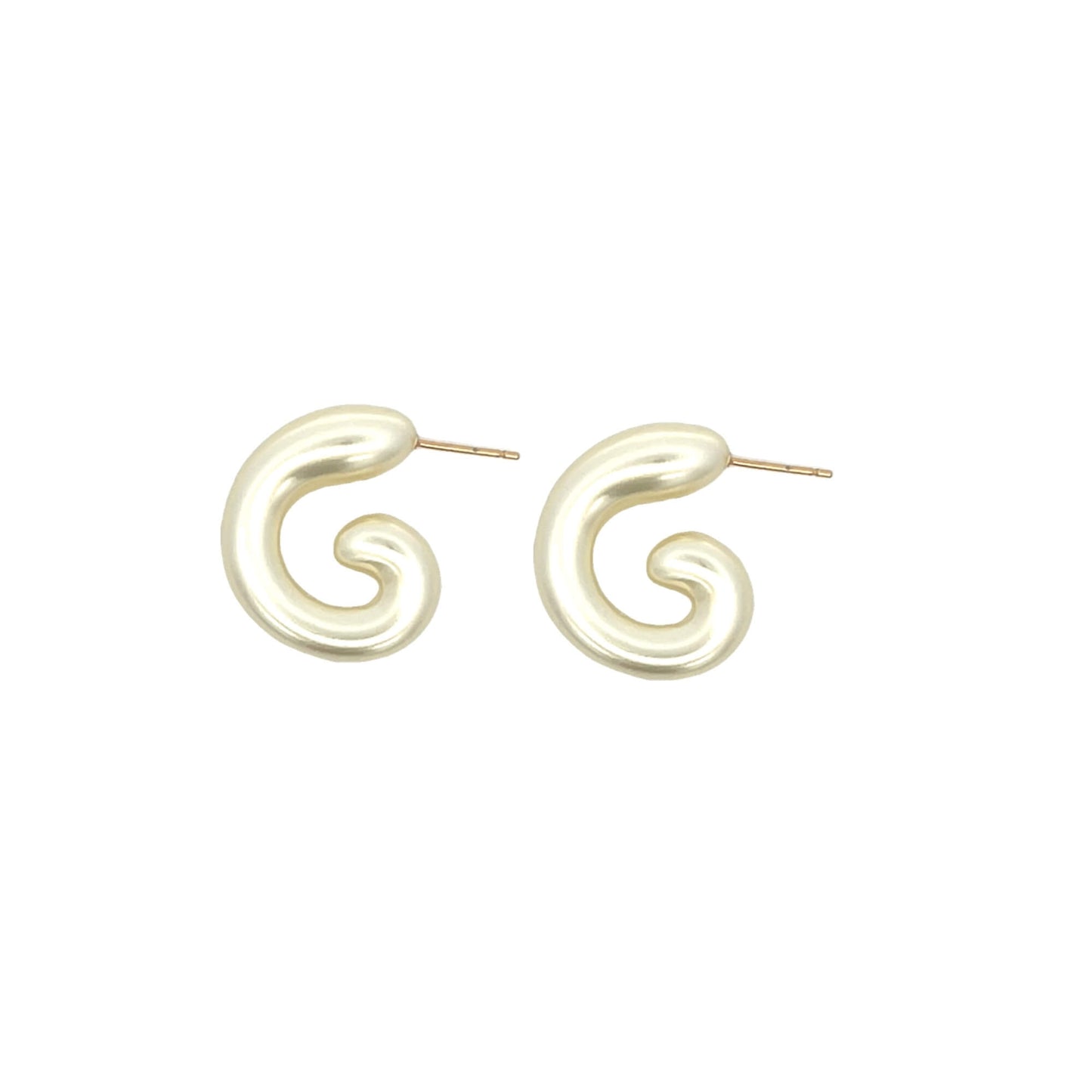 A pair of gold initial G stud earrings rests against a white background.