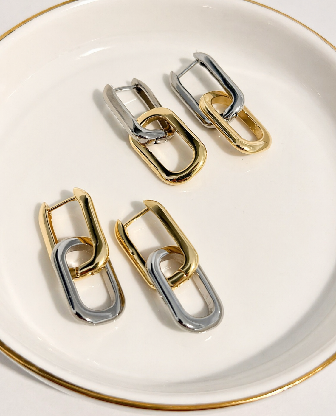Modern 18K gold filled paperclip link earrings with a stylish two-tone finish. Tarnish-resistant, lightweight and perfect for everyday wear.