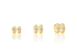 Three pairs of gold huggie hoop earrings featuring pavé-set cubic zirconia stones display their reflections on a white surface.