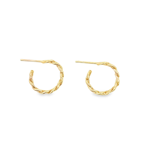 A pair of small, twisted gold hoop earrings rest against a clean white background.
