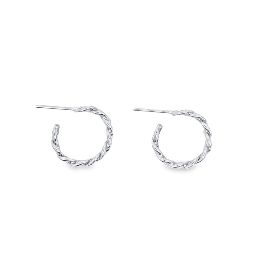 A pair of polished silver twisted hoop earrings rest on a clean white background.