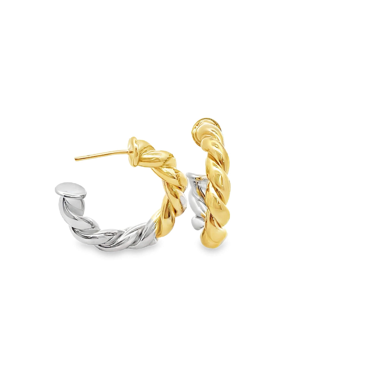 Two-tone twisted hoop earrings showcase a gleaming combination of yellow gold and silver metal against a clean white background.