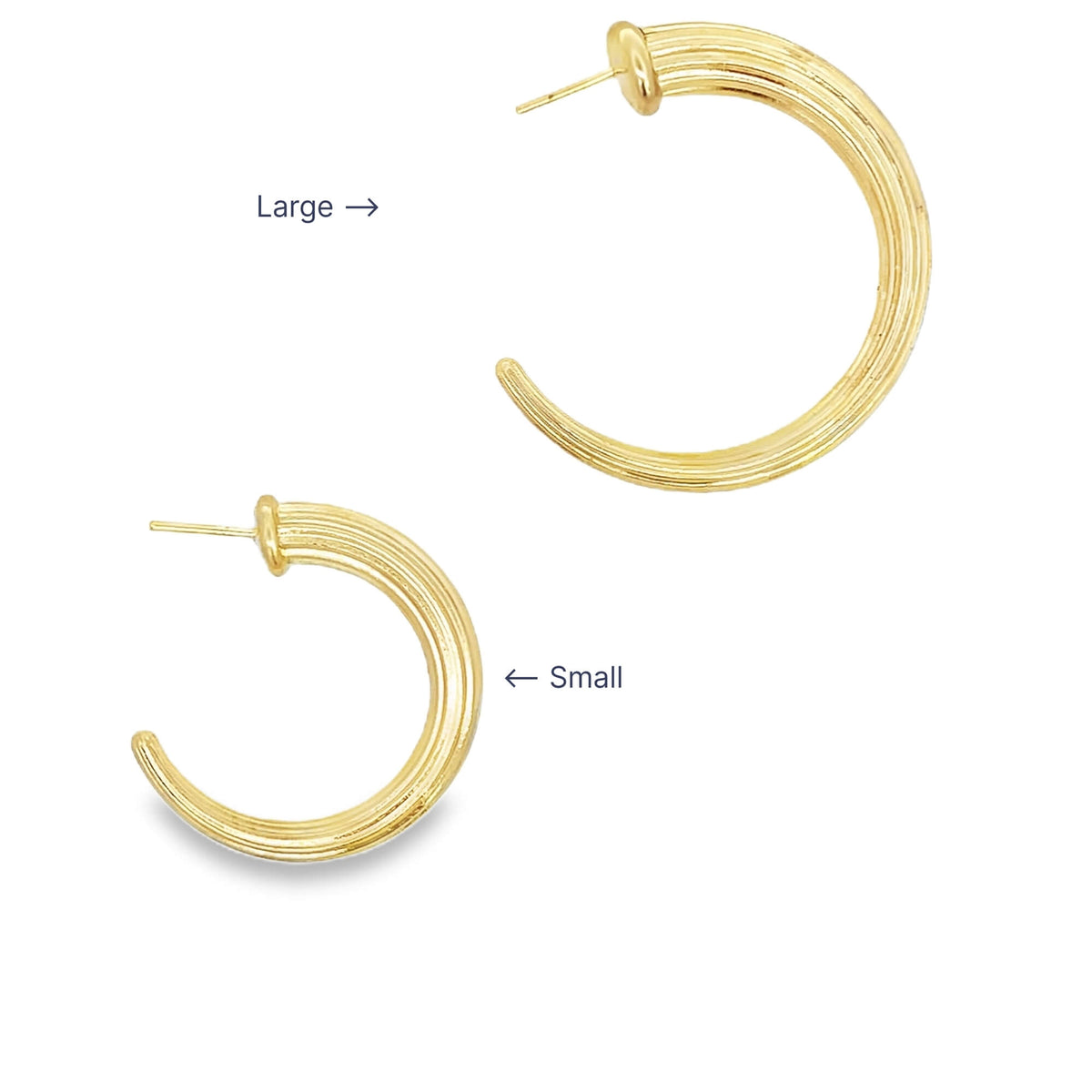 Two ribbed gold hoop earrings are displayed in large and small sizes against a white background.