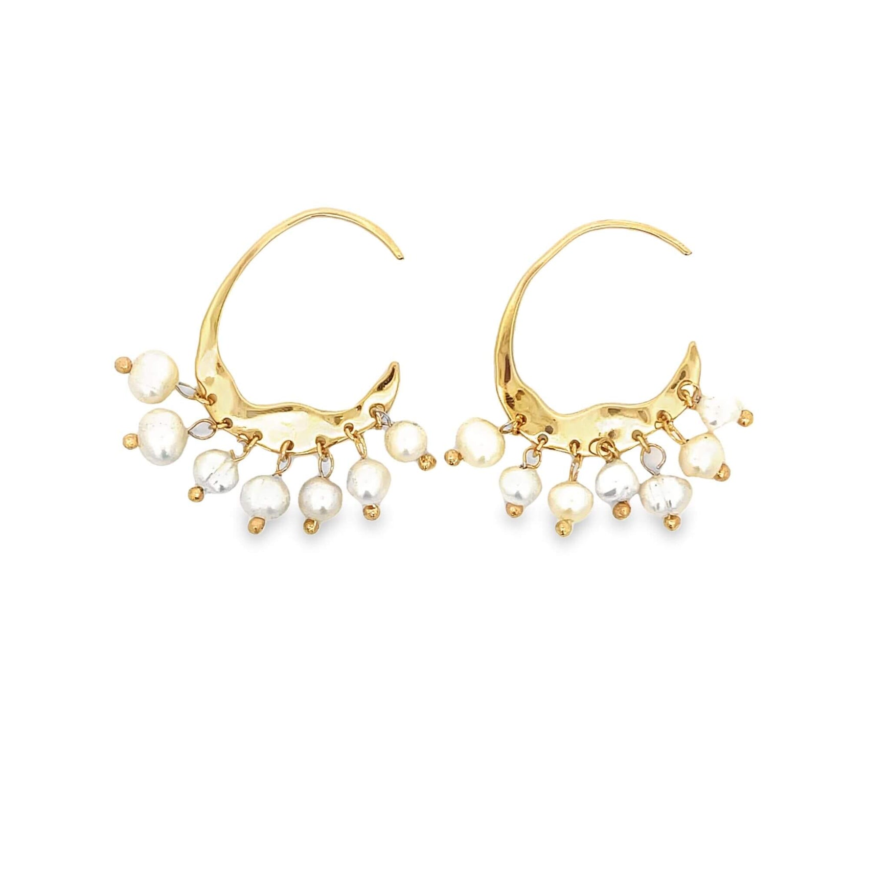A pair of elegant gold crescent-shaped hoop earrings features dangling freshwater pearls on a clean white background.
