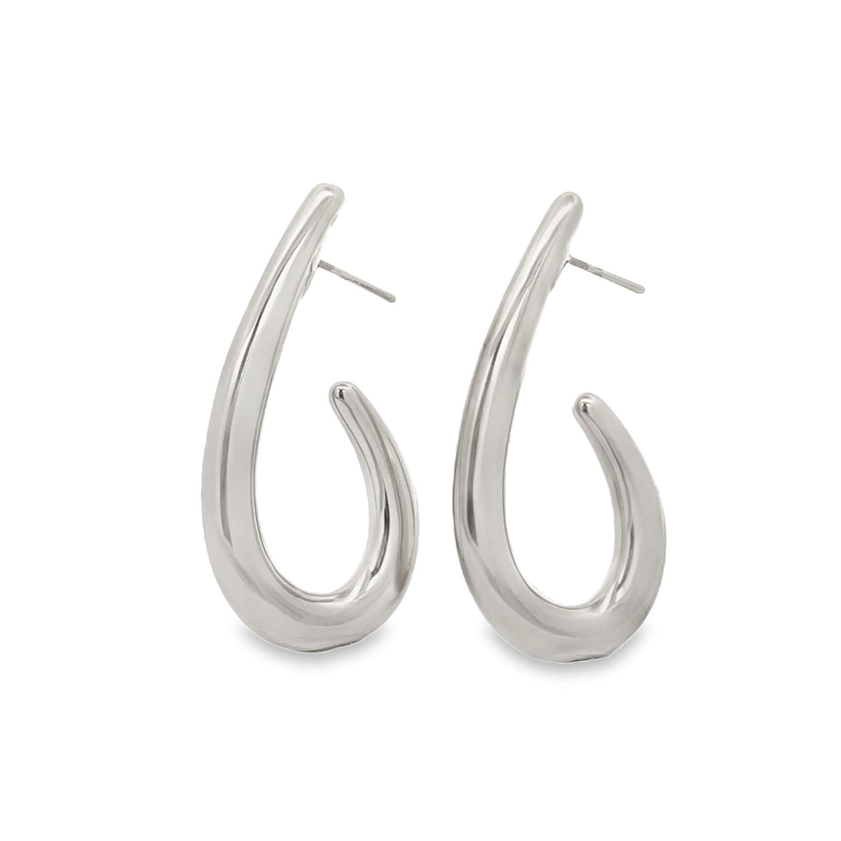 A pair of shiny silver teardrop hoop earrings rests against a clean white background.