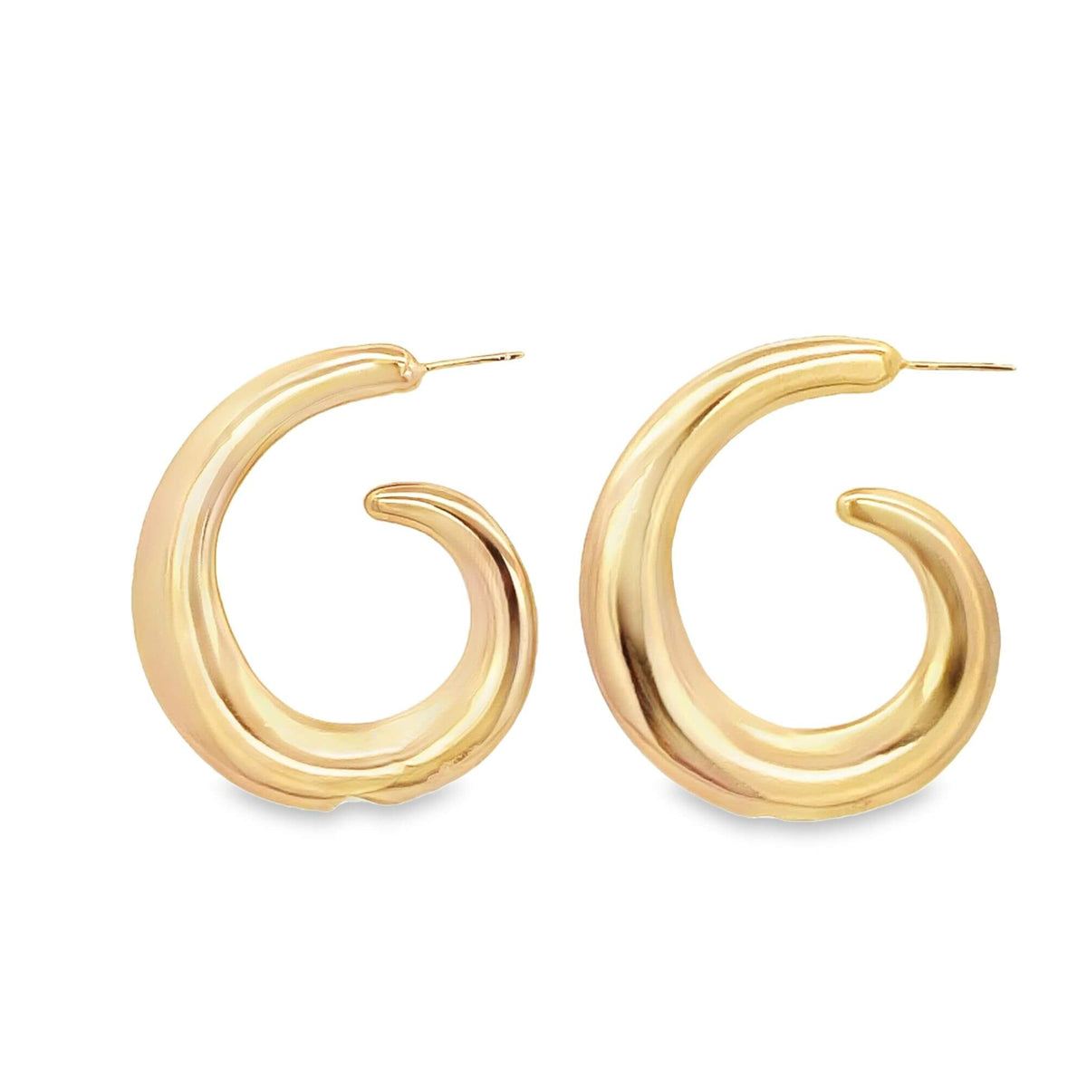 A pair of thick, polished gold hoop earrings with a modern swirl design rests against a clean white background.