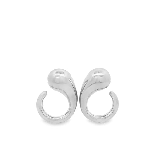 A pair of glossy silver teardrop earrings displays a modern, sculptural design against a plain white background.