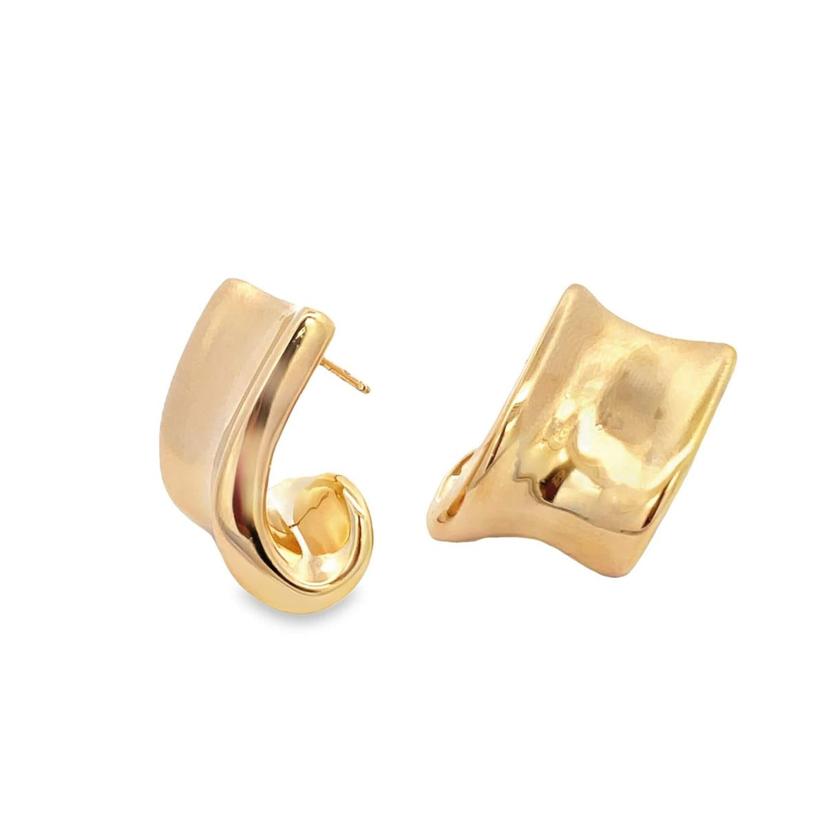 A pair of glossy gold hoop earrings rests against a white background, showcasing a modern, twisted design.