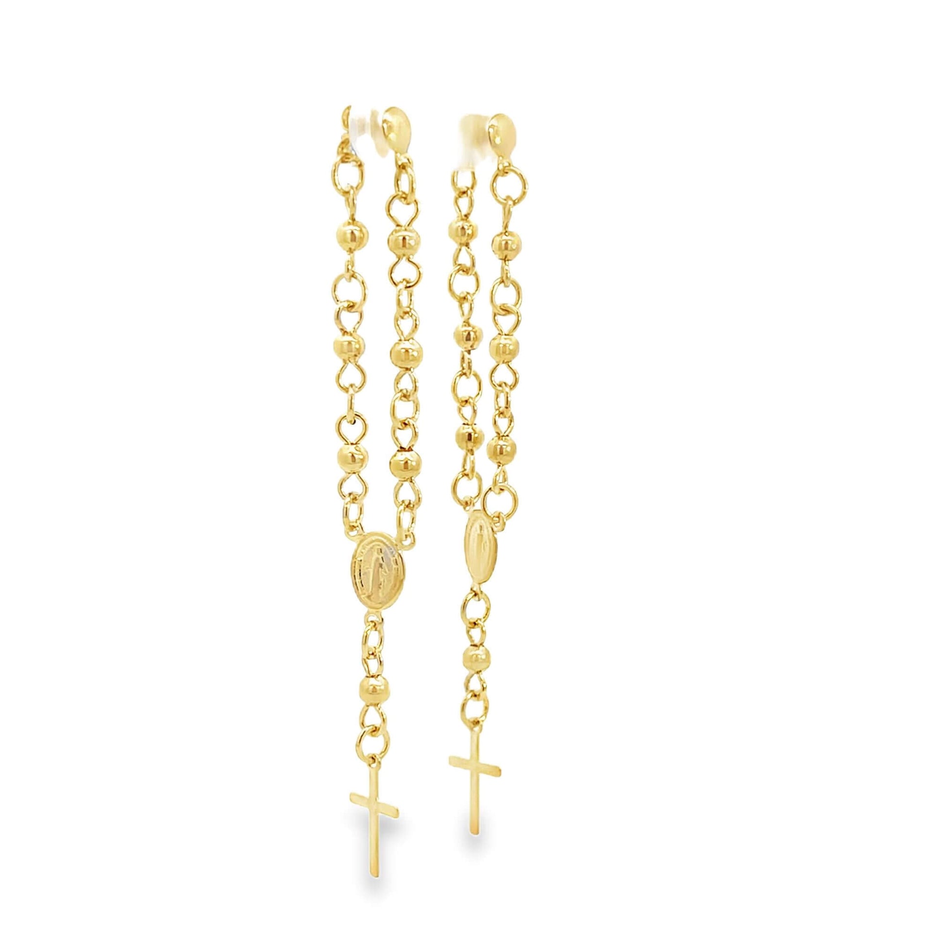 A pair of elegant gold rosary drop earrings dangle against a clean white background, showcasing their intricate chain link design and delicate crucifix pendants.