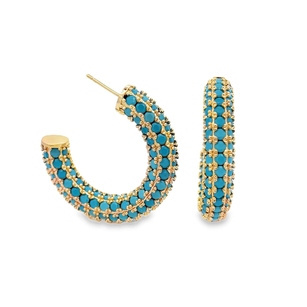 A pair of gold hoop earrings features vibrant turquoise gemstone beads embedded throughout the design against a white background.
