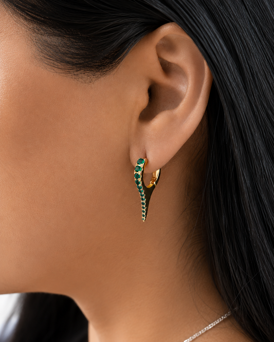 Premium Gold Filled spike huggie earrings featuring brilliant cubic zirconia. Available in Emerald Green, Turquoise, Clear, and Sapphire Blue for a modern everyday look.