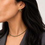 Shop elegant 18K Gold Filled Huggie Hoop Earrings featuring sparkling baguette-cut CZ stones. Lightweight, hypoallergenic, tarnish resistant, and available in multiple colors.