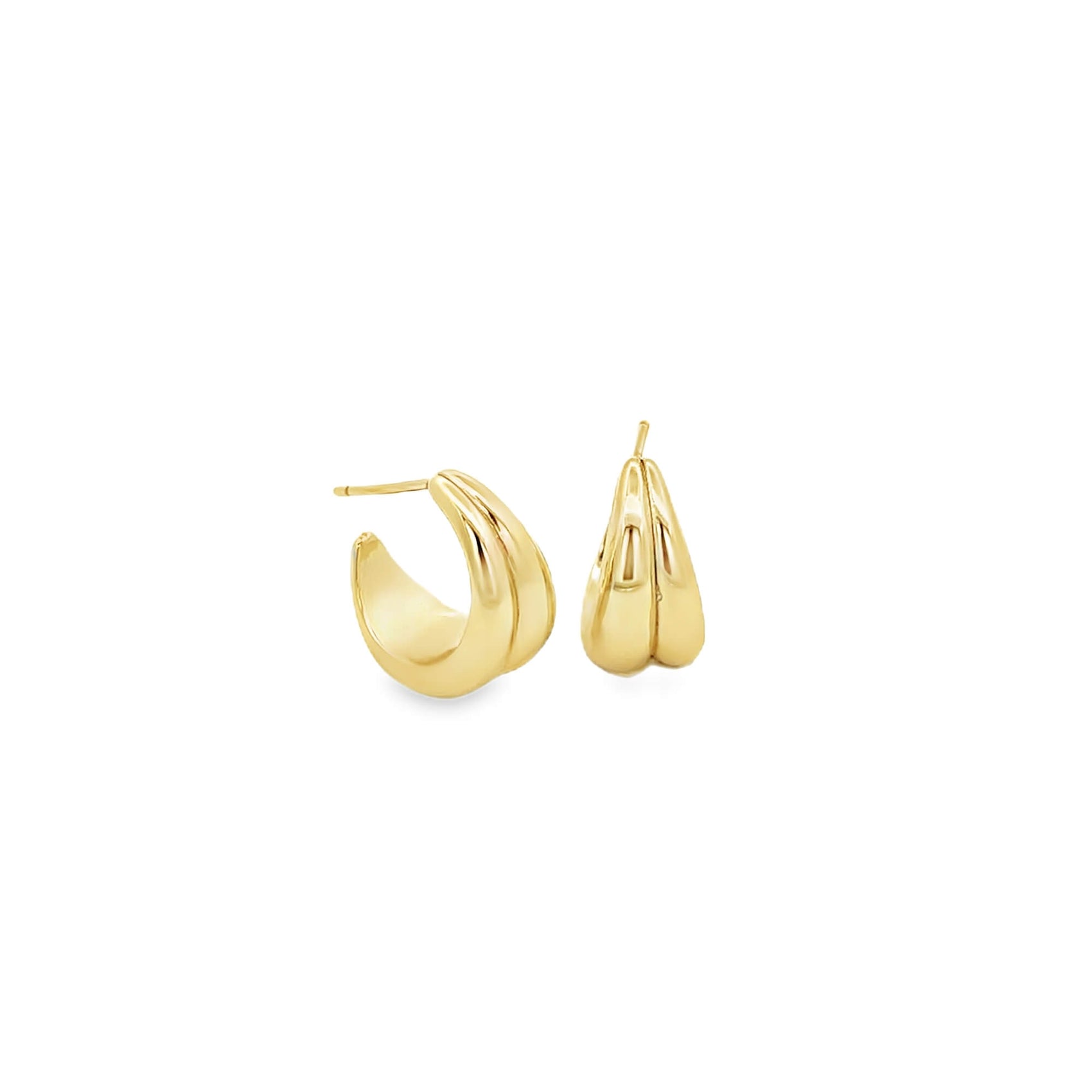 A pair of polished gold domed hoop earrings shines brightly against a clean white background.