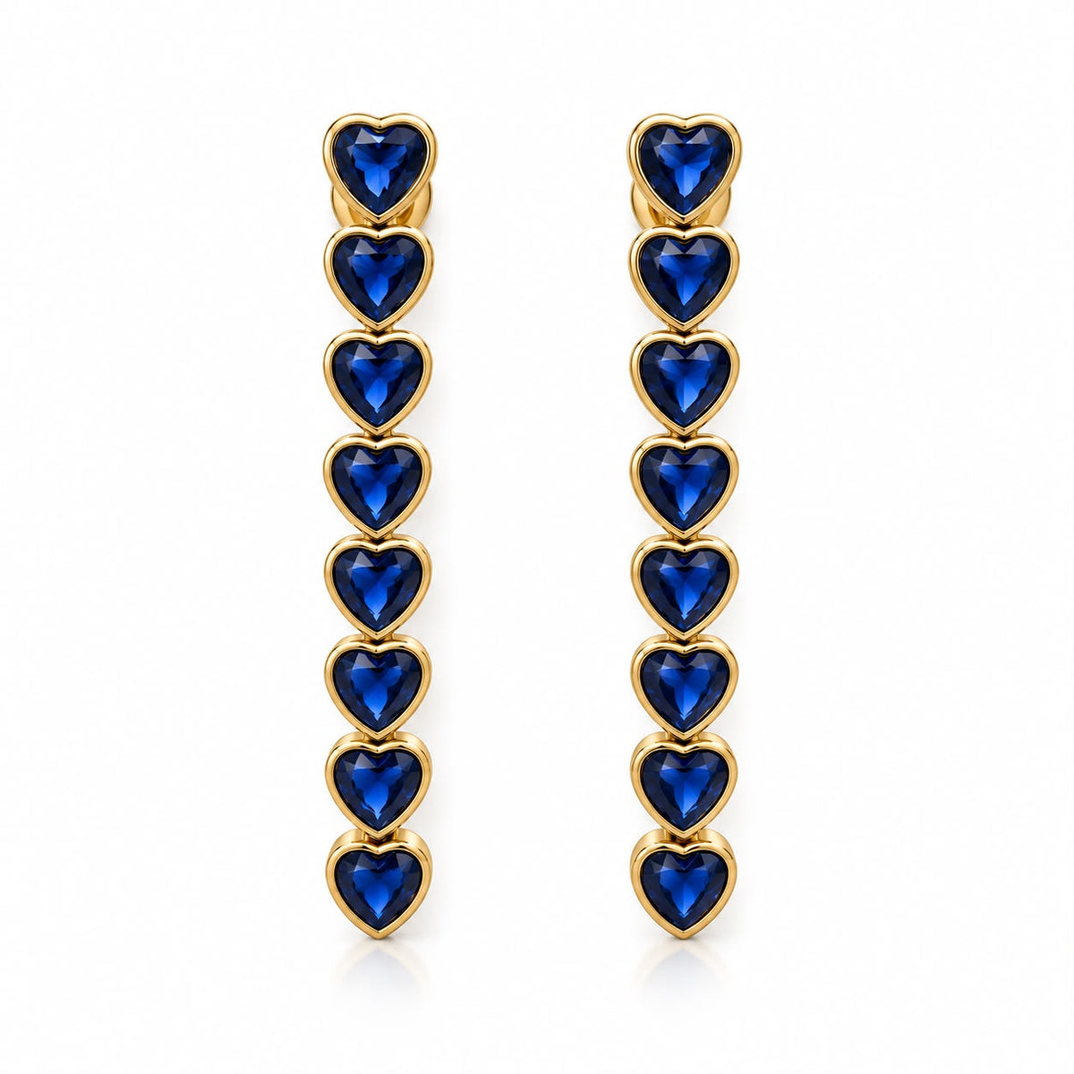 Shop elegant heart-shaped drop earrings featuring linked heart stones and an 18K Gold Filled finish. A sophisticated statement style available in multiple colors.