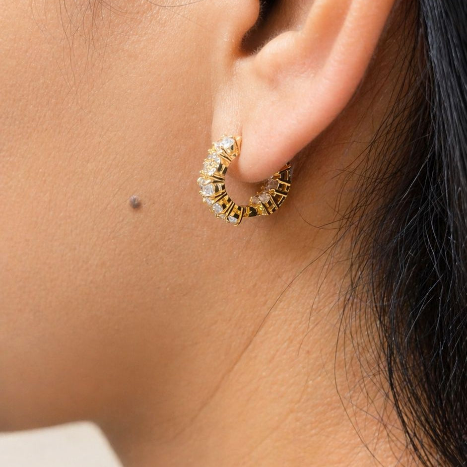 18K gold filled huggie earrings with pavé and gemstone details. Tarnish-resistant, hypoallergenic and perfect for everyday wear.