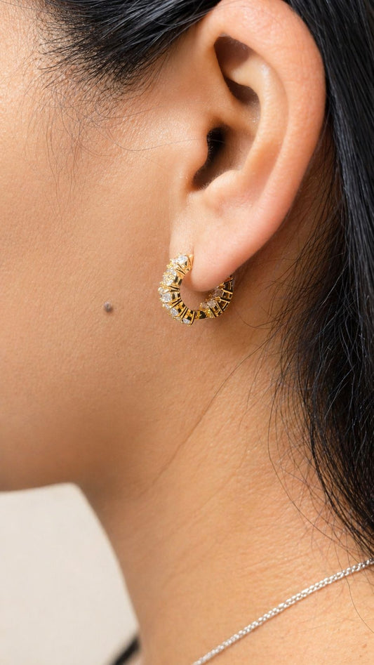 18K gold filled huggie earrings with pavé and gemstone details. Tarnish-resistant, hypoallergenic and perfect for everyday wear.