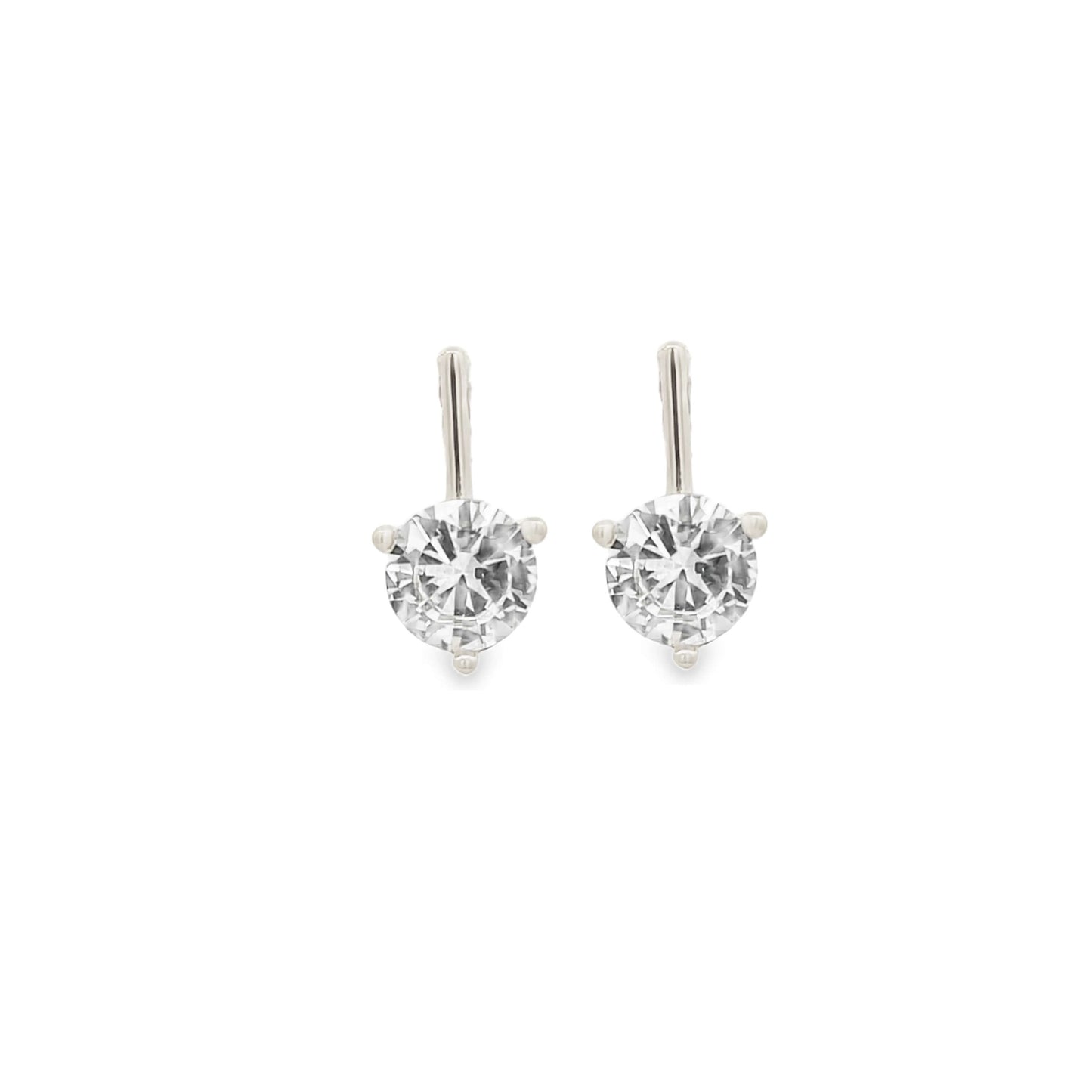 A pair of sparkling solitaire diamond drop earrings glimmers against a clean white background.