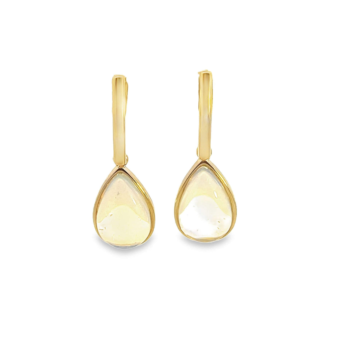 A pair of elegant gold earrings featuring teardrop-shaped mother-of-pearl gemstones dangles against a clean white background.
