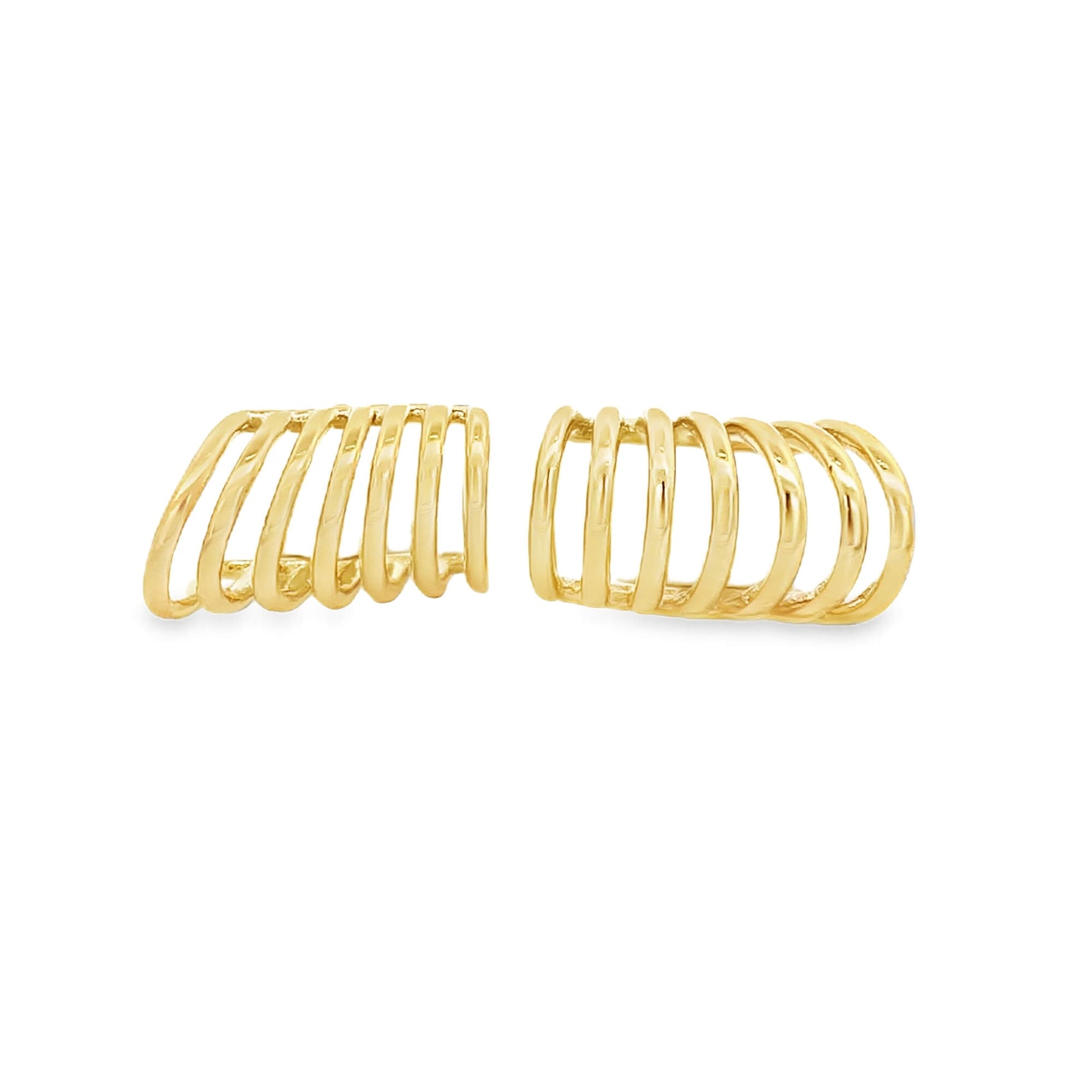 Two gold multi-strand ear cuffs rest side by side against a clean white background.