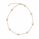 Elegant 18K gold filled piece with pearls set in a bezel, delicate pearls, and gold bar details. Lightweight, timeless, and perfect for everyday wear.