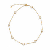 Elegant 18K gold filled piece with pearls set in a bezel, delicate pearls, and gold bar details. Lightweight, timeless, and perfect for everyday wear.
