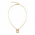 A delicate gold chain necklace displays a rectangular diamond-encrusted cross pendant against a plain white background.