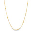 A delicate gold chain necklace drapes in a soft curve, featuring evenly spaced textured beads and delicate stations against a plain white background.