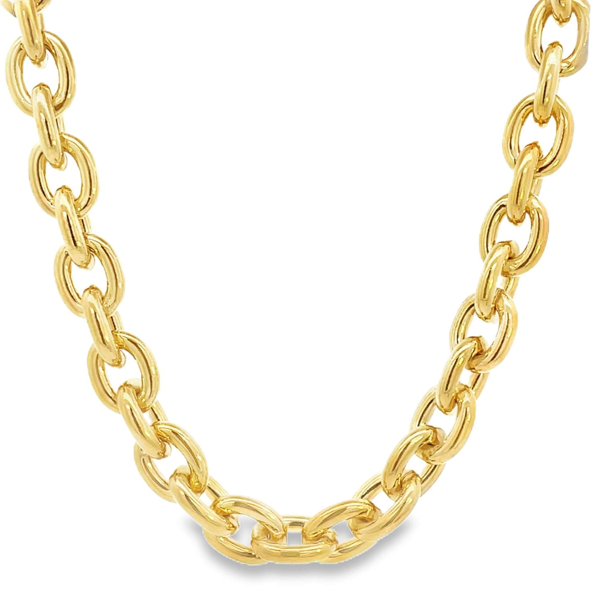 A thick yellow gold link chain necklace curves gracefully against a plain white background.