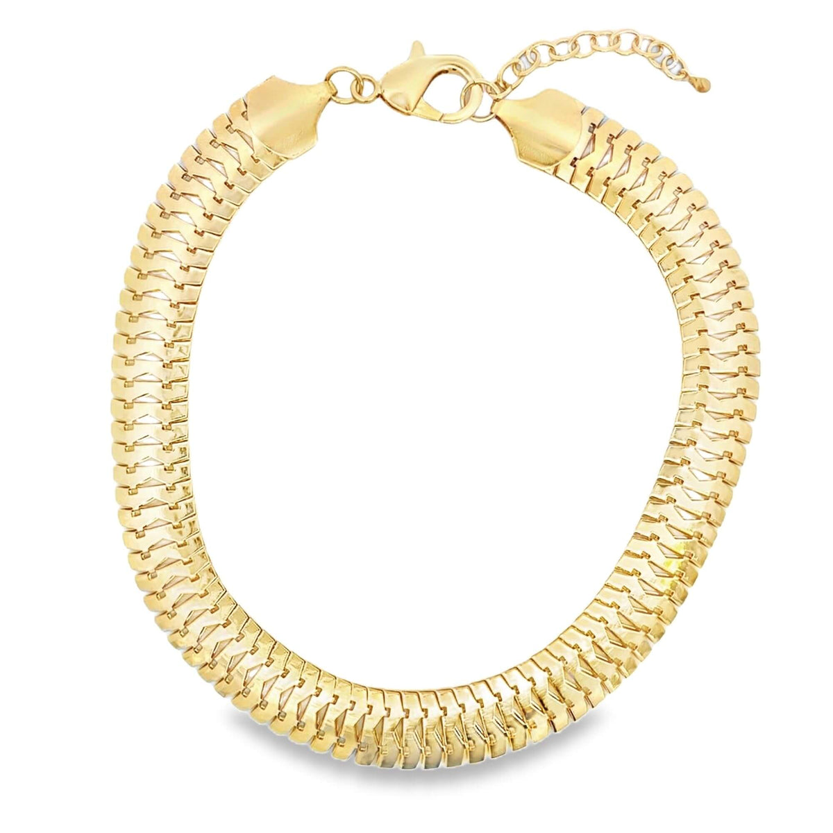 A wide, interlocking gold herringbone chain necklace curves gracefully against a plain white background, featuring a secure lobster clasp and an adjustable extension chain.