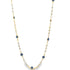A delicate gold chain necklace features alternating white pearls and blue evil eye beads against a white background.