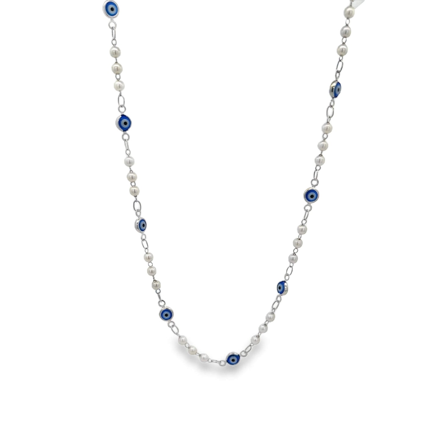 A delicate silver necklace features alternating white pearls and blue evil eye beads against a clean white background.