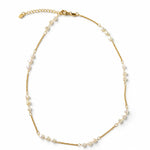 Delicate 18K Gold Filled choker featuring heart-shaped pearls on a fine station chain. Elegant, feminine and perfect for layering.