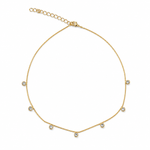 Elegant 14-inch station choker featuring bezel-set Cubic Zirconia stones on a delicate 18K Gold Filled chain. Perfect for layering or everyday wear.