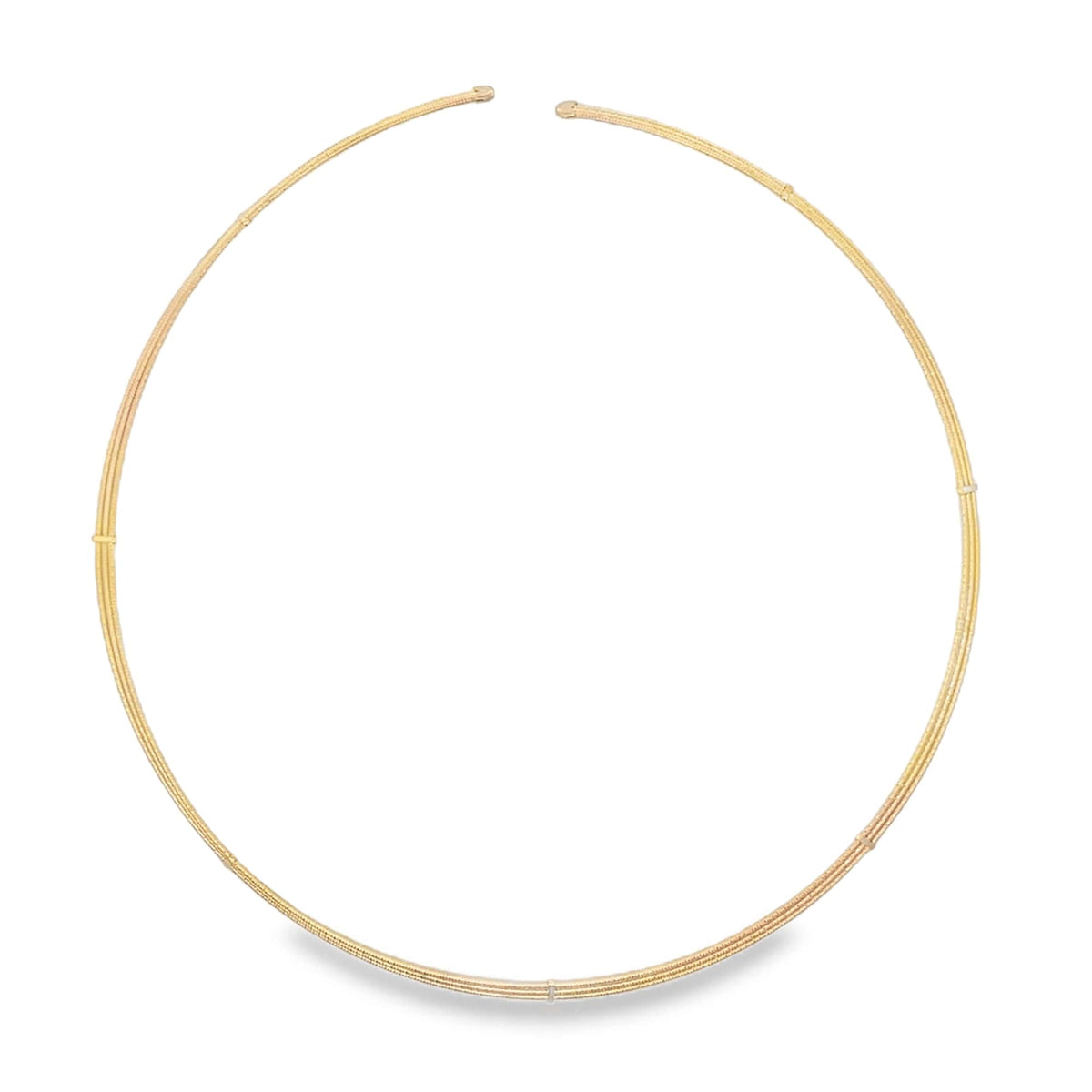 A sleek yellow gold collar necklace curves gracefully against a plain white background.