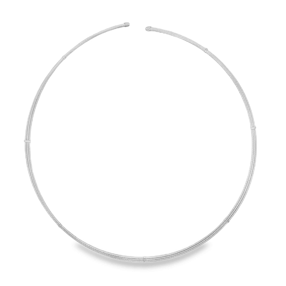 A sleek, open silver choker necklace curves gracefully against a plain white background.