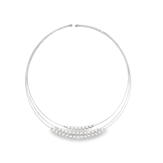 A multi-strand silver choker necklace features graduating rows of polished metallic beads displayed against a clean white background.