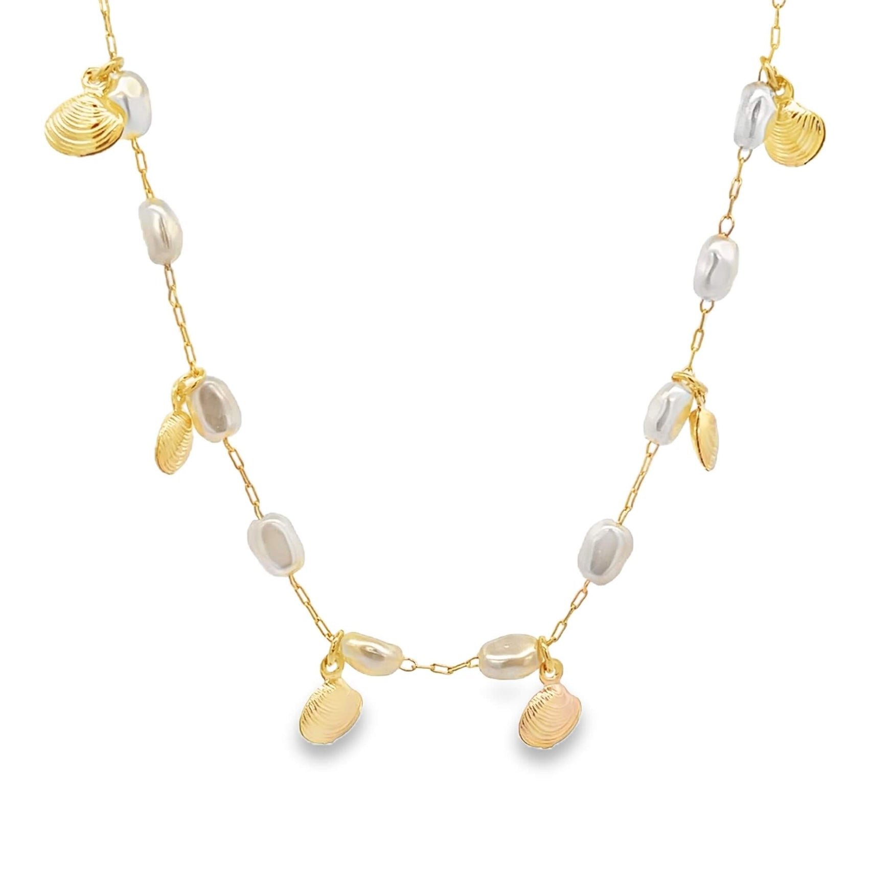 A delicate gold chain necklace features alternating white pearls and dangling gold seashell charms.