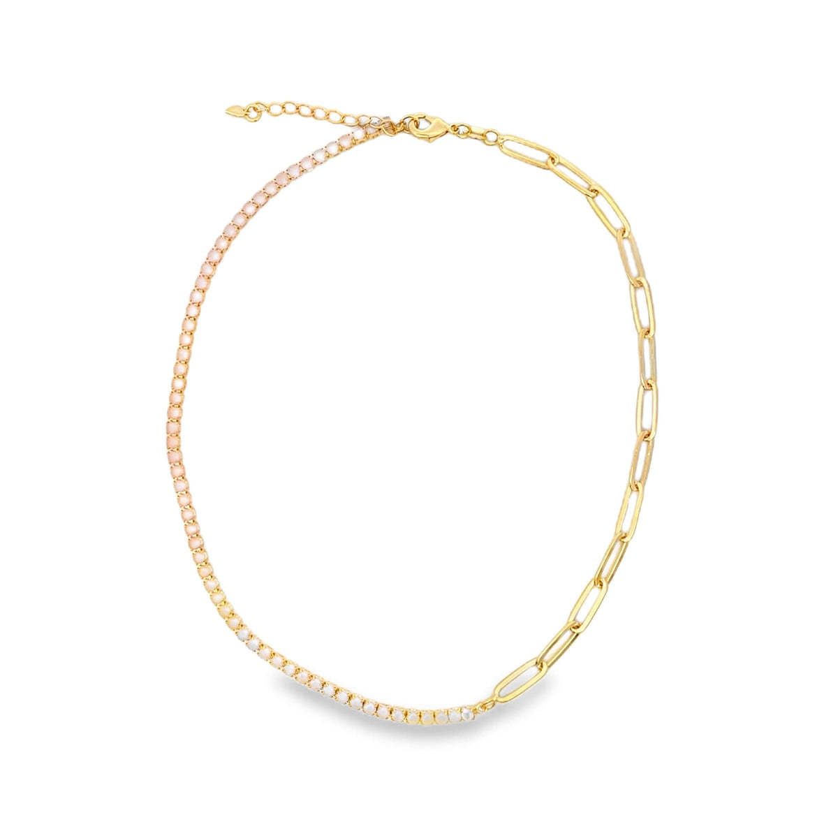 A mixed-link gold necklace features a delicate crystal-encrusted chain on one side and chunky paperclip links on the other.