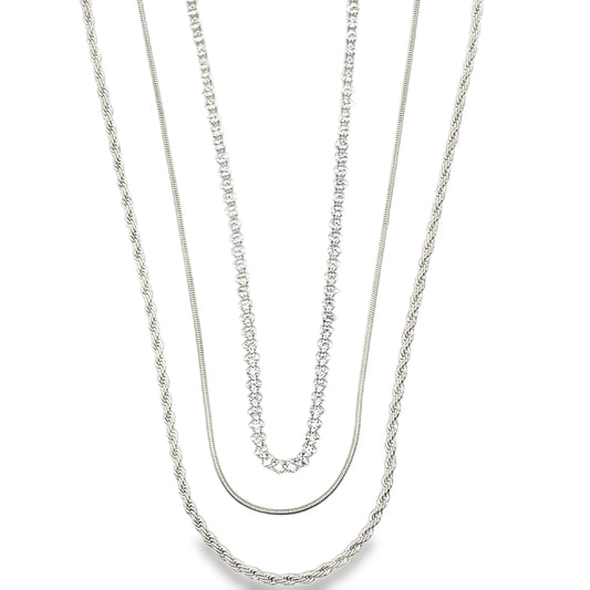 Elegant triple layer necklace with rope, snake and sparkling tennis chain. Minimalist layered jewelry in gold or silver. Perfect for everyday wear.