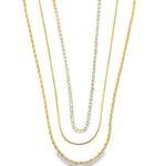 Elegant triple layer necklace with rope, snake and sparkling tennis chain. Minimalist layered jewelry in gold or silver. Perfect for everyday wear.