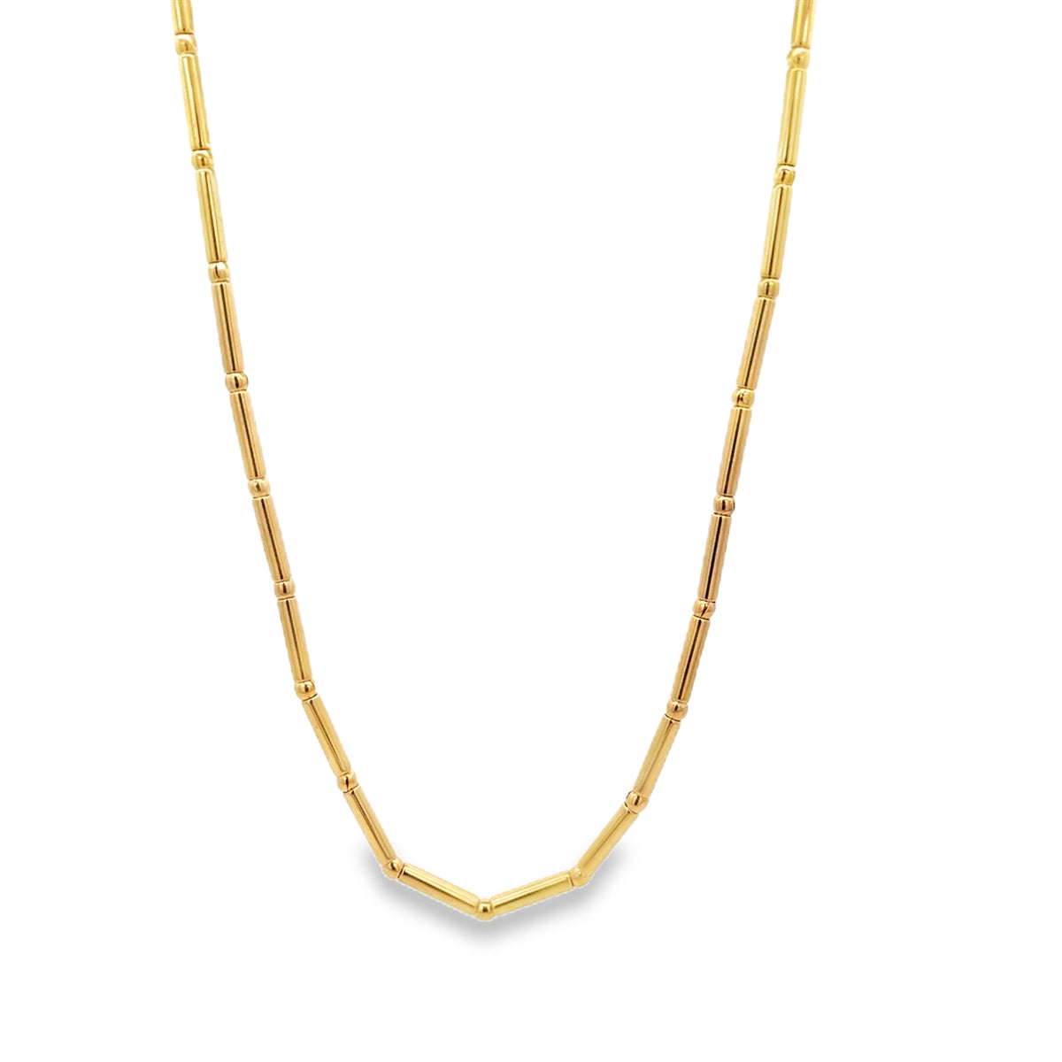 A delicate gold bar bead necklace displays evenly spaced metallic segments against a clean white background.