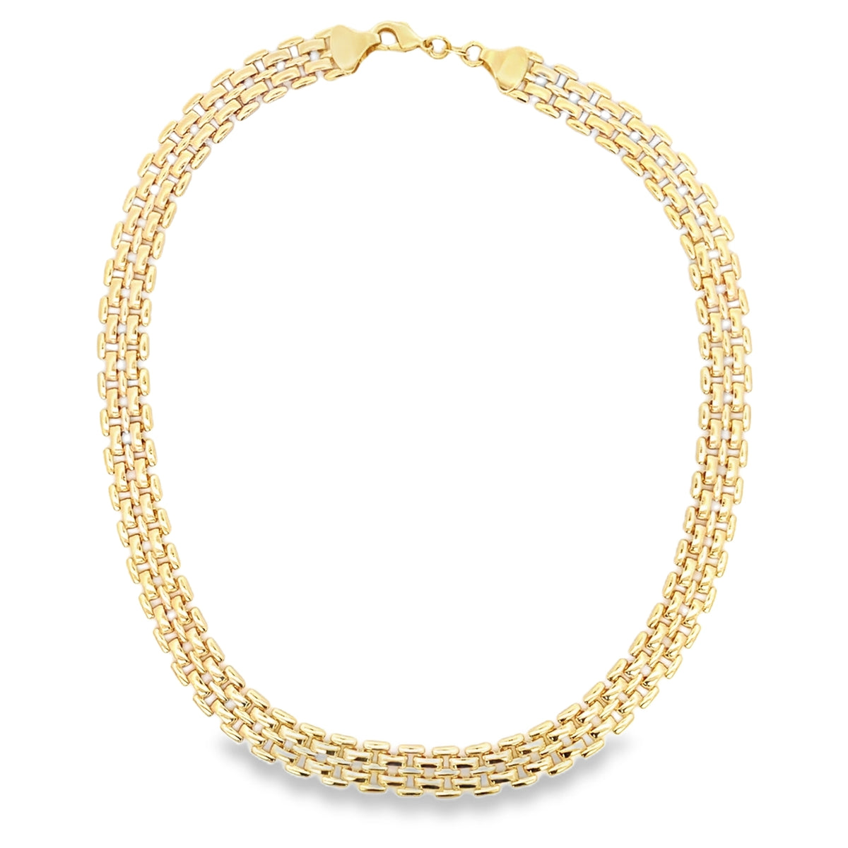 A polished gold brick-link necklace rests in a circular shape on a white background.