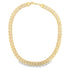 A polished gold brick-link necklace rests in a circular shape on a white background.