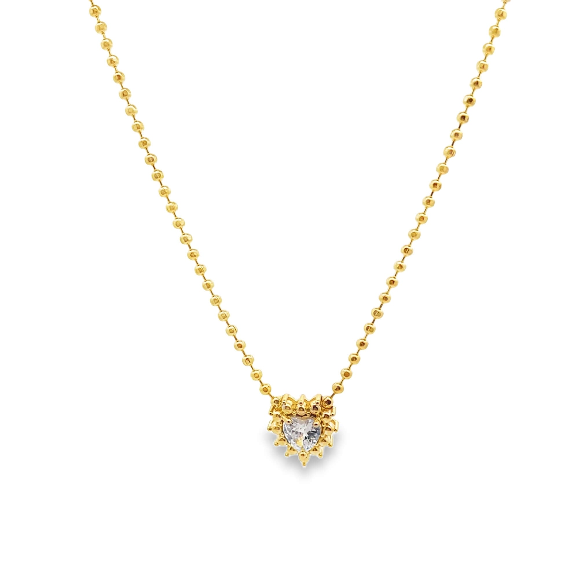 Gold necklace with a heart-shaped pendant on a white background