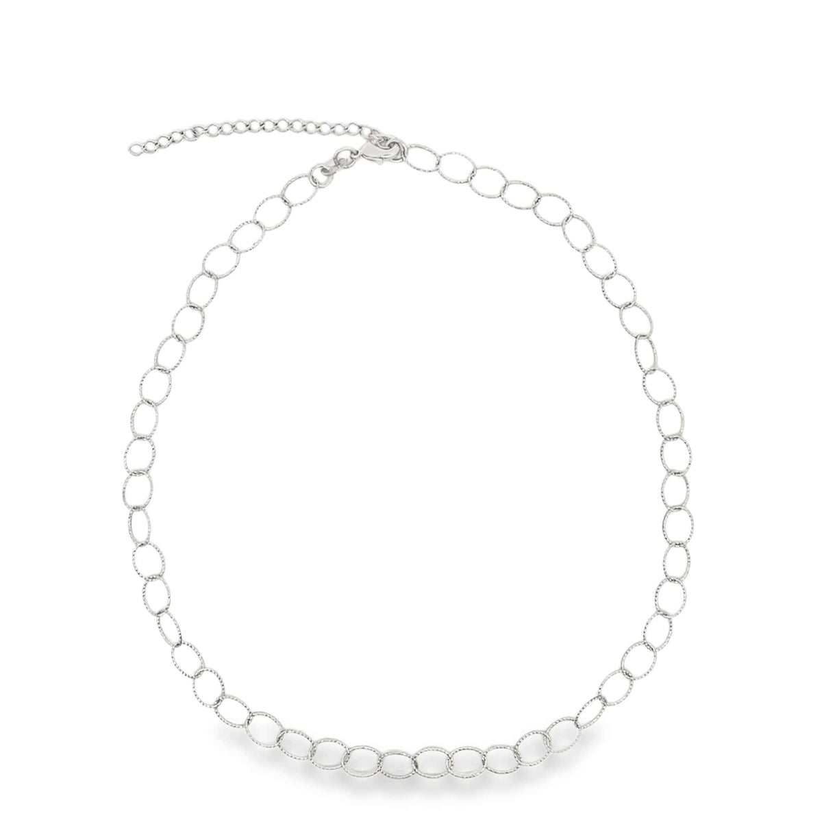 A delicate silver link choker necklace curves gracefully against a plain white background, showcasing its sparkling interlocking circles and adjustable extender chain.
